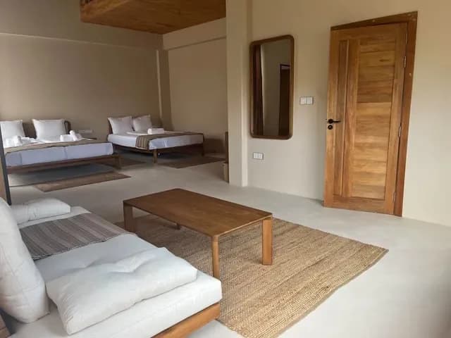 Family Room with multiple beds and sofa